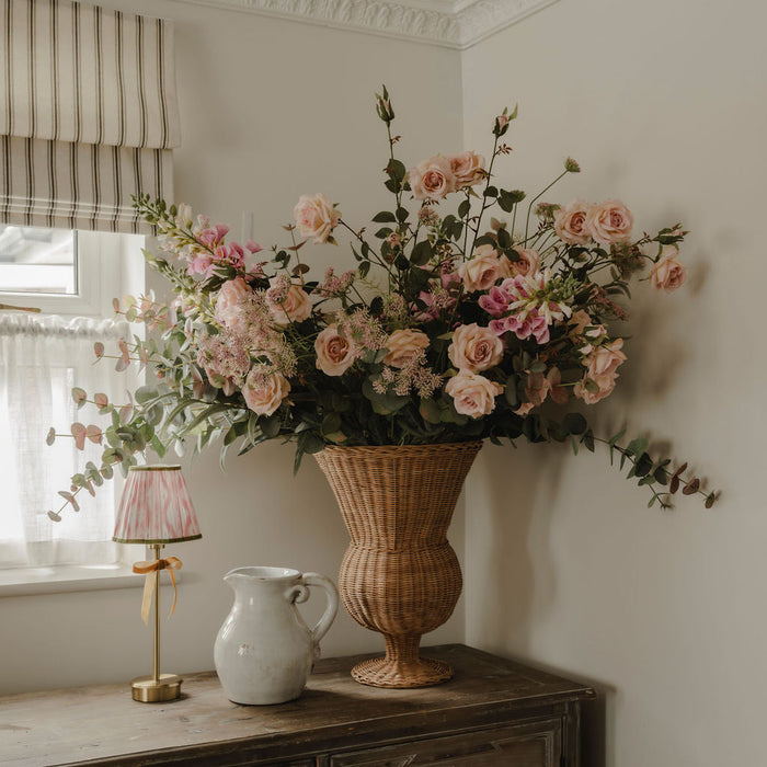 Faux floral stems arranged in a vase