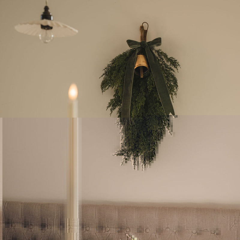 Real touch cedar cypress swag styled across a fireplace mantel