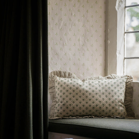 Floral block print cushion with striped trim
Hand block printed floral cushion with feather pad
Artisan floral cushion for sofa styling
Decorative floral cushion with striped border
Traditional block print cushion for layered interiors
Floral patterned cushion styled on an armchair
Luxury feather filled floral cushion
Classic floral cushion with complementary stripe trim