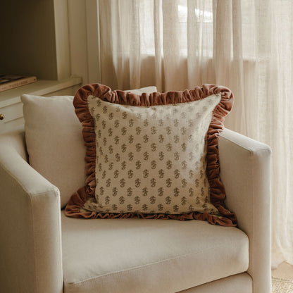 Floral block print cushion with striped trim
Hand block printed floral cushion with feather pad
Artisan floral cushion for sofa styling
Decorative floral cushion with striped border
Traditional block print cushion for layered interiors
Floral patterned cushion styled on an armchair
Luxury feather filled floral cushion
Classic floral cushion with complementary stripe trim