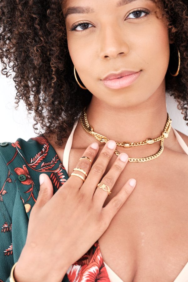 model wearing gold beaded choker necklace