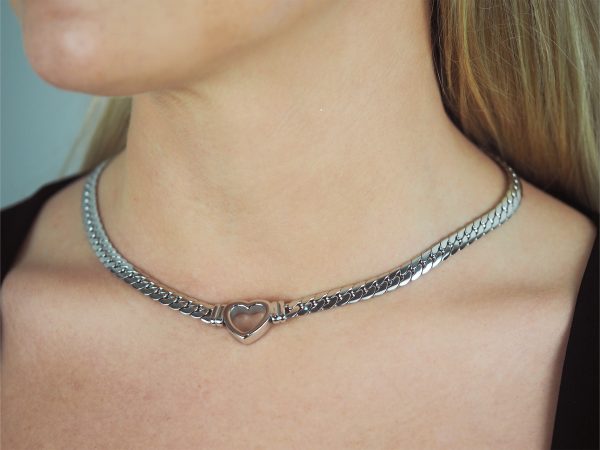 model wearing silver heart chain necklace